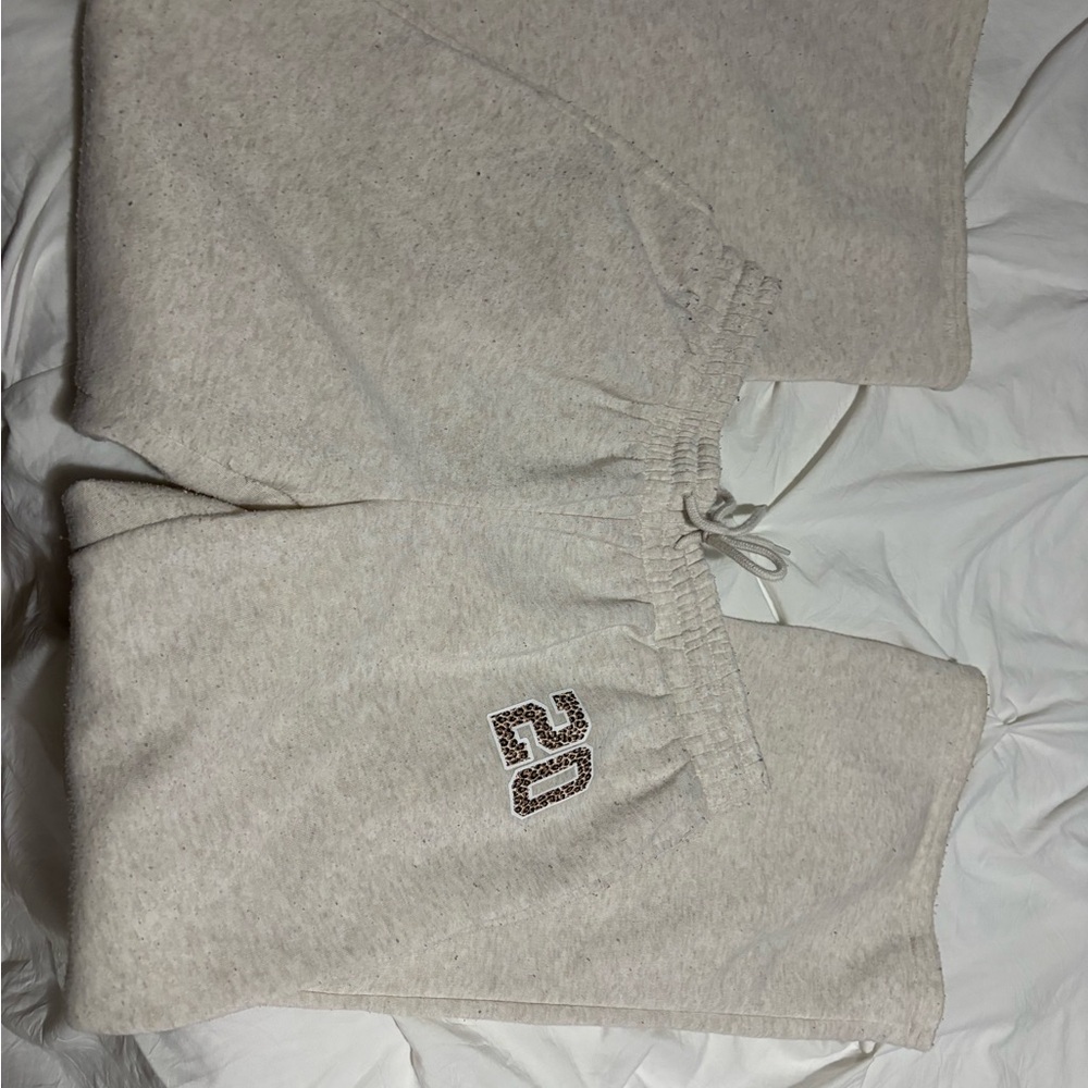 refuge Beige Sweatshorts with Leopard '20' Accent